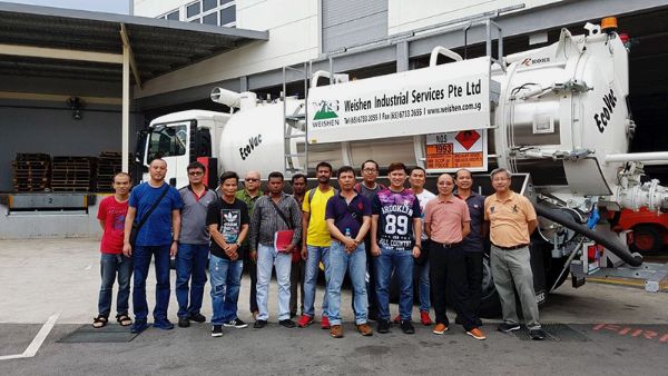 KOKS Academy students KOKS EcoVac vacuum truck